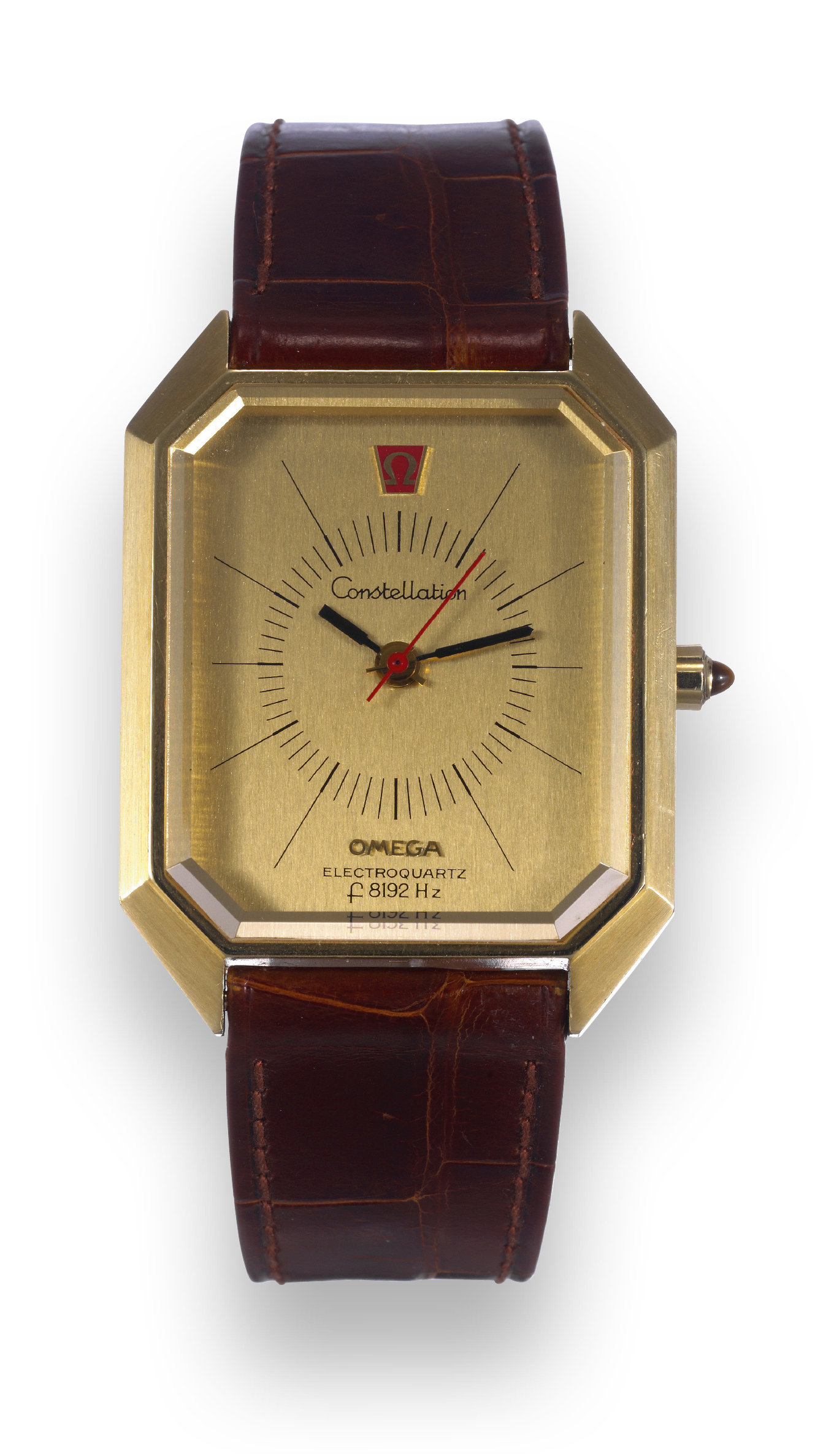 Omega, 'Constellation, Electroquartz, f 8192 Hz', No. 31737236, Ref.  BA191.0003. Sold on April 16, 1975. Fine and rare, rectangular, center  seconds, 18K yellow gold quartz wristwatch with faceted synthetic sapphire  crystal and
