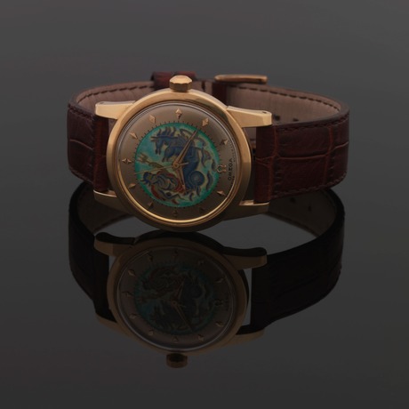 OMEGA REF. 2520 AUTOMATIC CLOISONNE ENAMEL DIAL YELLOW GOLD Omega,  Neptune's Chariot Cloisonné Enamel Dial, Automatic, Chronometer, Officially  Certified, No. 12430172, case No. 11046362, Ref. 2520 / 2577. Made in 1952.  Fine