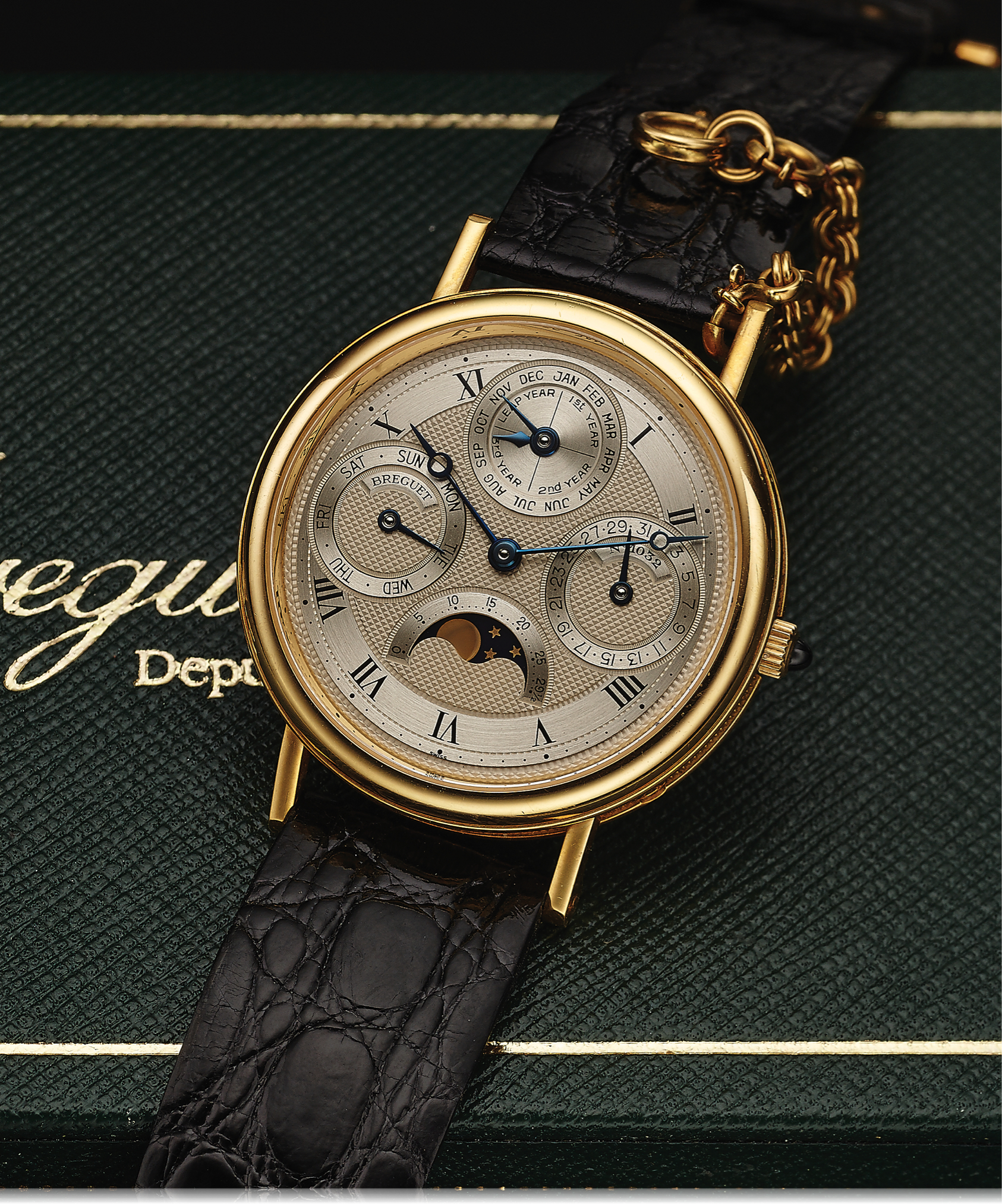 BREGUET REF. 3050 PERPETUAL CALENDAR YELLOW GOLD Breguet, No. 1032,  movement No. 106, Ref. 3050. Made in the 1990s. Very fine and rare,  self-winding, 18K yellow gold wristwatch with perpetual calendar, moon